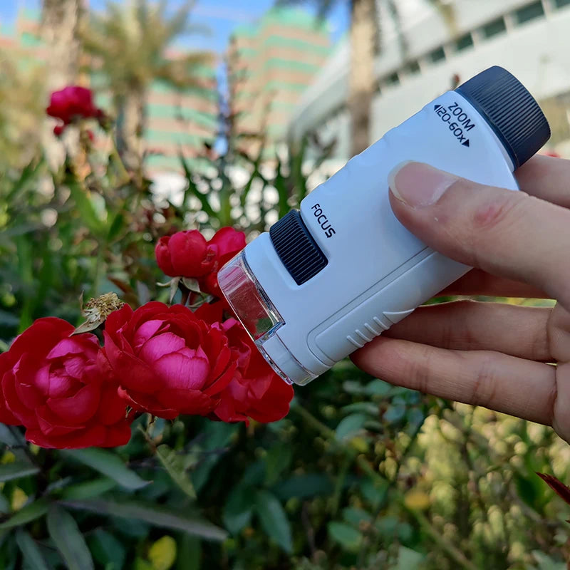 Mini handheld educational microscope with LED light