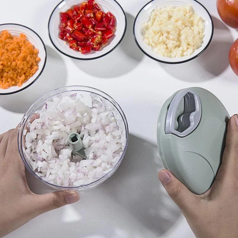 Manual meat and vegetable grinder